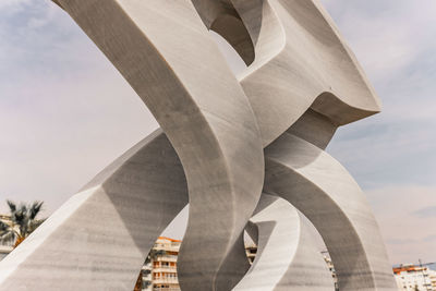 Low angle view of statue against sky