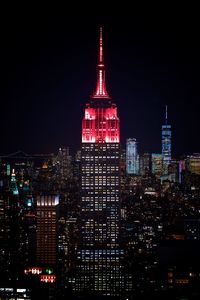 Illuminated buildings in city at night