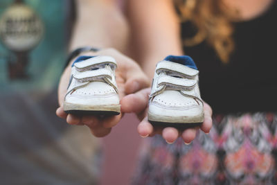 Close-up of woman holding hands