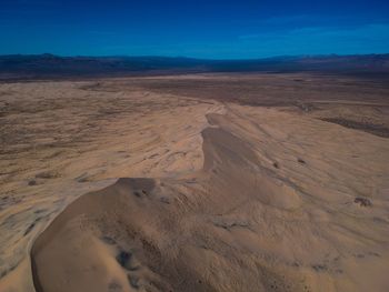 Scenic view of desert against sky