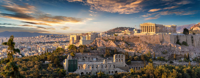 Cityscape against sky during sunset