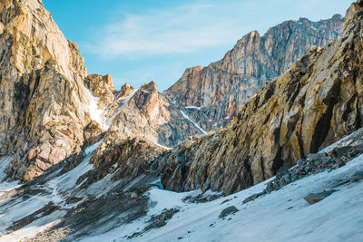 Panoramic view of snowcapped mountains against sky