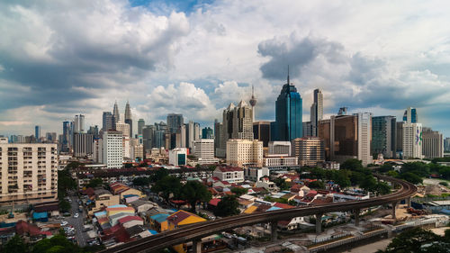 Modern buildings in city against sky