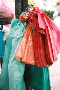 Assorted single use plastic bags in various colors.