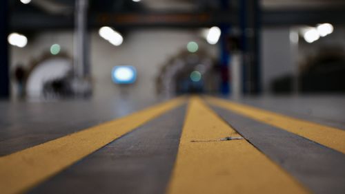 Surface level of illuminated railroad station platform