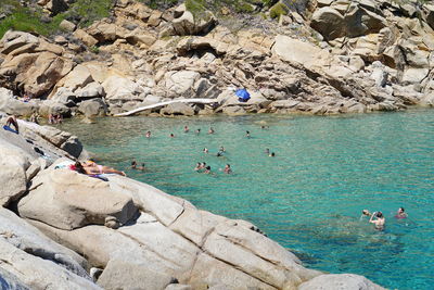 Tourists on rock formation