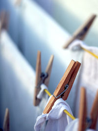 Close-up of clothespins on clothesline