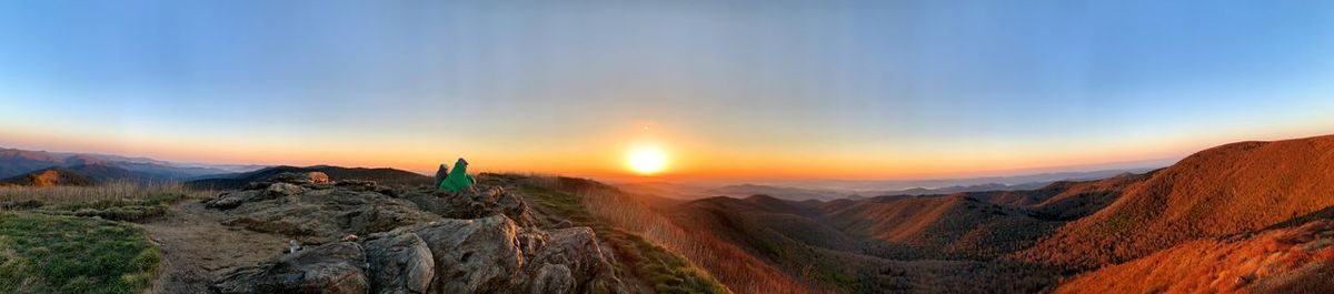Panoramic view of landscape against sky during sunset