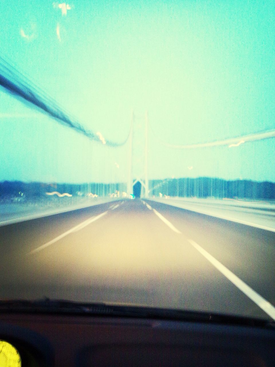 transportation, road, mode of transport, the way forward, windshield, vehicle interior, land vehicle, car, road marking, glass - material, diminishing perspective, transparent, car interior, travel, on the move, vanishing point, sky, car point of view, country road, highway