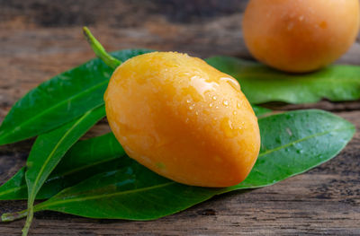 Close-up of orange fruit on table