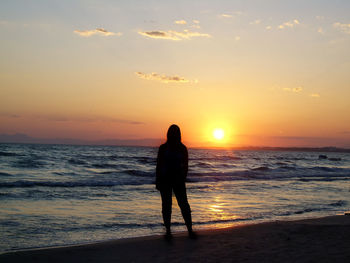 Scenic view of sea at sunset