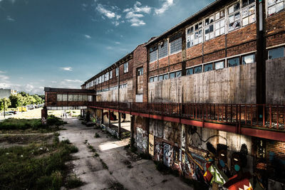 View of abandoned building against sky