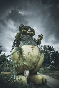 Low angle view of statue against sky