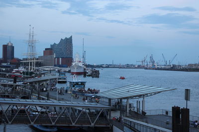 High angle view of boats moored at harbor