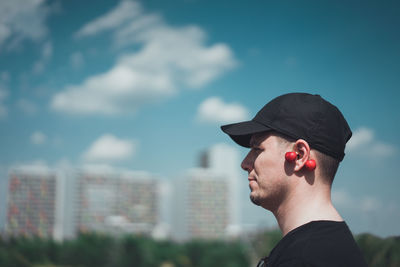 Profile view of man against sky