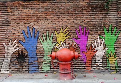 Graffiti on brick wall