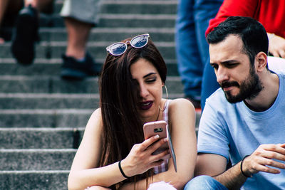 Young man using smart phone