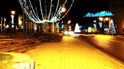 Illuminated street light at night