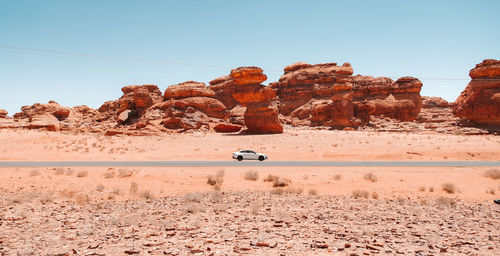 Scenic view of desert against clear sky