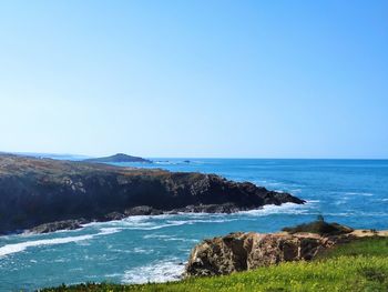 Scenic view of sea against clear sky