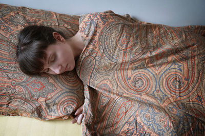 Young woman sleeping at home