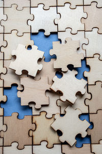 Full frame shot of wooden jigsaw puzzle
