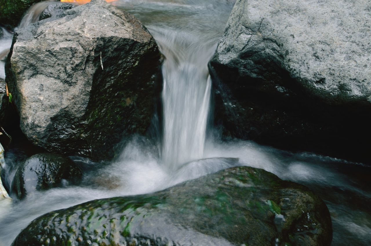 WATERFALL IN ROCKS