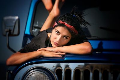 Portrait of woman sitting in car