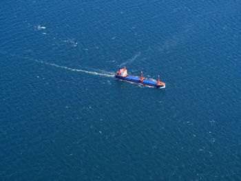 Cargo ship carrying goods aerial view
