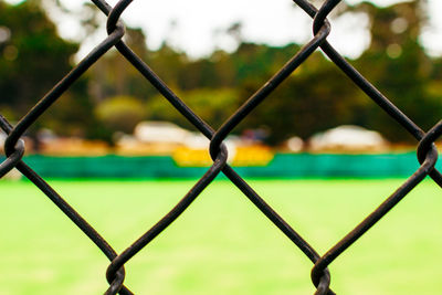 Close-up of chainlink fence in park