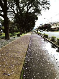 View of empty road along canal