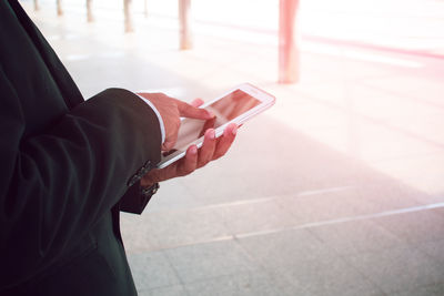 High angle view of man using mobile phone