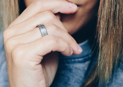 Close-up of couple holding hands