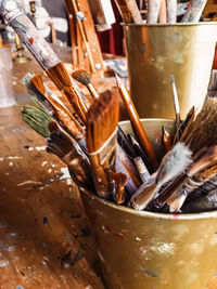 High angle view of paintbrushes on table