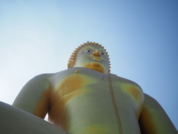 Low angle view of statue against sky