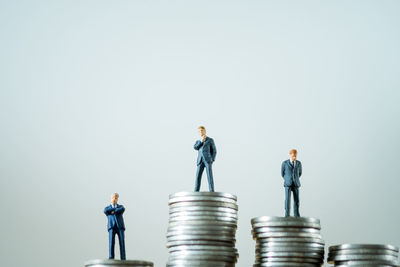 Low angle view of two people against white background