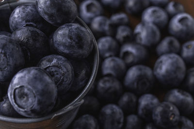 High angle view of blueberries in container