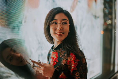 Portrait of a smiling young woman