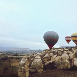 Hot air balloon over landscape