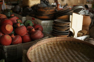 Earthenware for sale at market stall