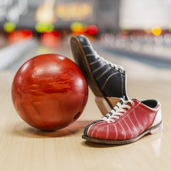 Close-up of red shoes on table