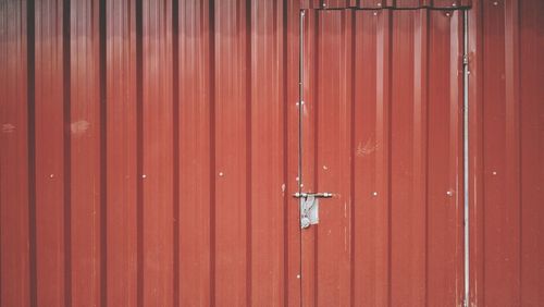 Closed red metallic door