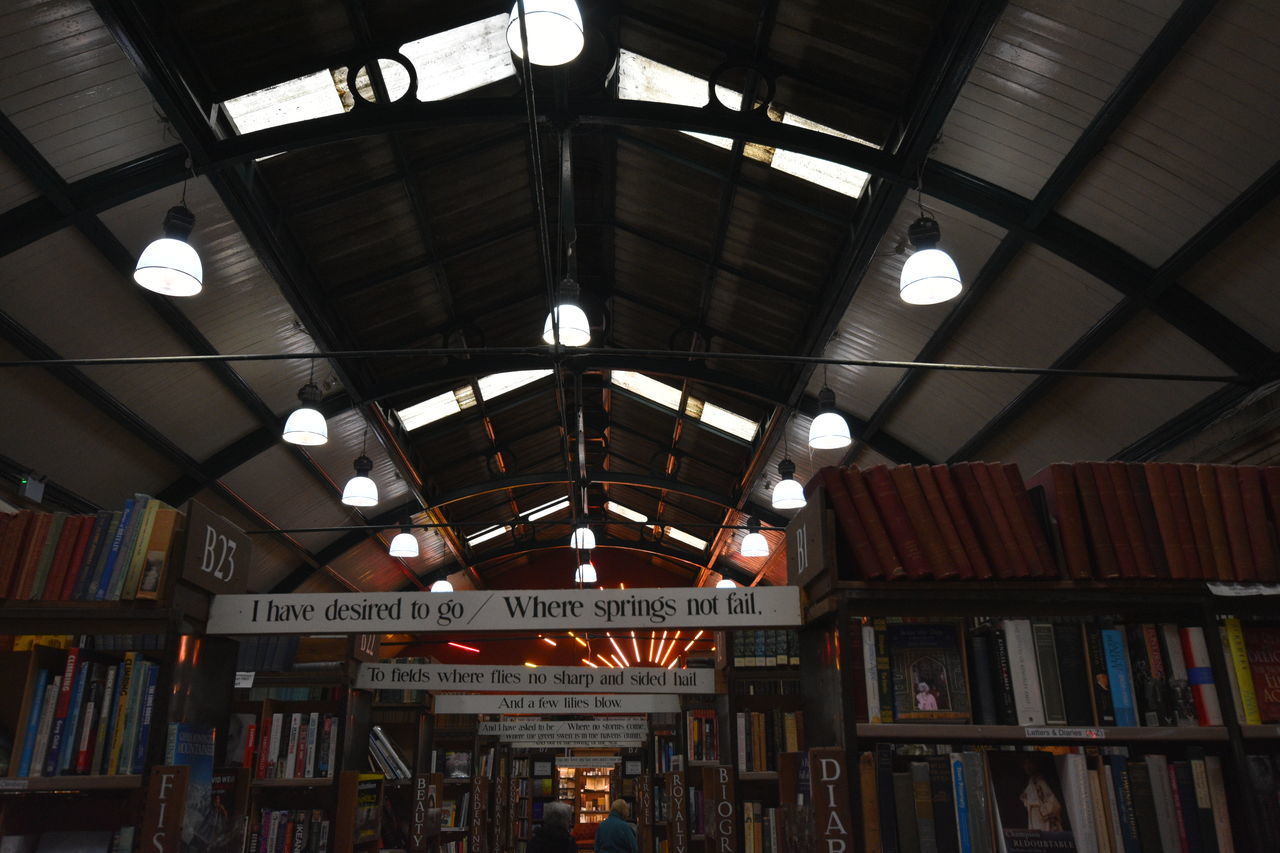 LOW ANGLE VIEW OF ILLUMINATED CEILING IN EMPTY ROOM