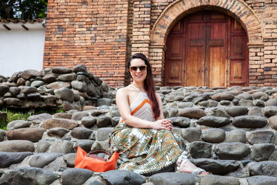 Beautiful young woman at the historical san antonio church located in the city of cali in colombia