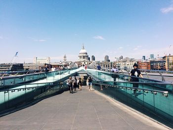 Walkway leading towards city