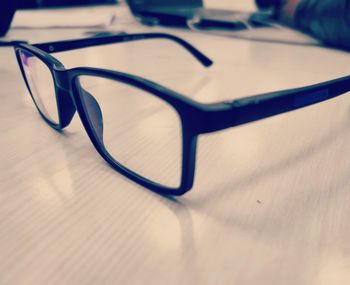 Close-up of eyeglasses on table