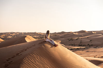 Scenic view of desert against clear sky