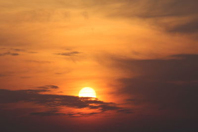 Low angle view of dramatic sky during sunset