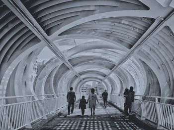 People walking in tunnel