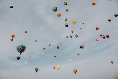 Low angle view of balloons in sky